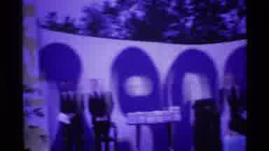 Ohio USA (1969): Graduation Celebration With Officials On Stage And Graduates