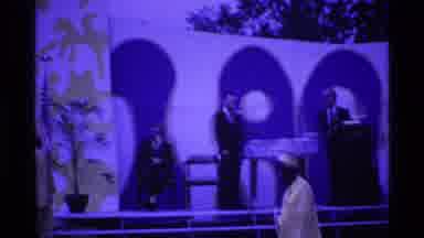 Ohio USA (1969): Graduate Wearing Grey Gown Walks Across Stage To Receive Diploma