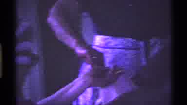 Ohio USA (1969): Woman Wearing White Apron And Glasses Helping To Stuff Turkey