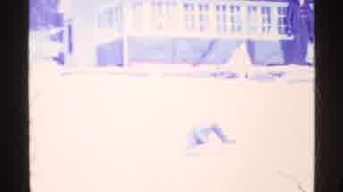 Ohio USA (1969): Outdoor Recording Showing A Young Boy Playing On The Snow