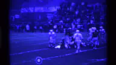 Ohio USA (1969): Players Tackle And Block During A Football Game In Ohio