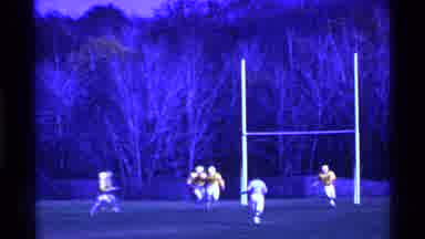 Ohio USA (1969): A Group Of Rugby Playing In The Huge Ground Playing Very