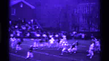 Ohio USA (1969): American Football Match With Cheerleaders In The Background