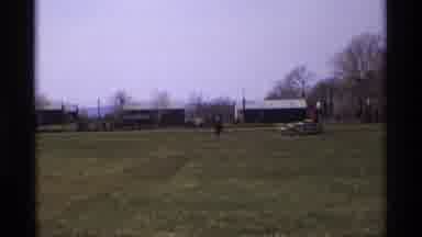 Florida Michigan (1970): A Boy And The People Are Playing In A Huge Ground Were No