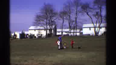 Florida Michigan (1970): Father Teaches Kids How To Fly A Kite