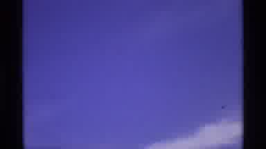 Florida Michigan (1970): Blue Sky With Only A Few Clouds Zoom In To Look Further