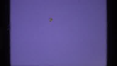 Florida Michigan (1970): View Of Red And Yellow Kite Flying Blue Sky On A Clear