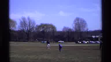 Florida Michigan (1970): A Man Dressed In A Blue Jacket And A Boy Play With A Ball