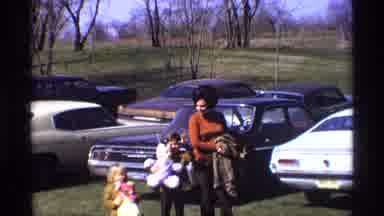 Florida Michigan (1970): Mother And Two Children With Toys Waving Near Parked
