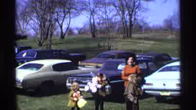 Florida Michigan (1970): Women With Two Small Children Outside Near Many Cars And