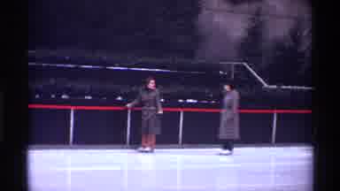 New York City (1970): Ice Skating New York City Cold Fun Holding Wall Outside