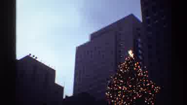 New York City (1970): A Gradual Zoom In Close Up Of The Star At The Top Of A Large