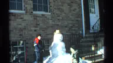 New York City (1970): Two Children Are Outdoor And They Have Made A Snowman