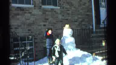New York City (1970): Footage Of Kids Waving At Camera Next To Snowman
