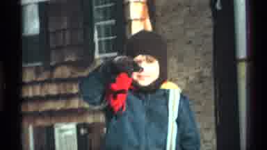 New York City (1970): Young Boy Waving Cold Snow Jacket House Outside Street Zoom