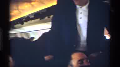 New York City (1970): A Man Takes A Seat Next To An Excited Boy In A Railroad Car