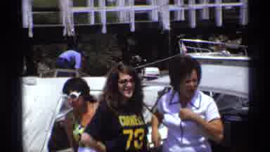 New York (1973): People On Camping Trip In Front Of Cars Saying Hello