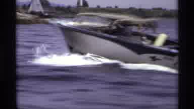 New York (1973): View Of Blue And White Speedboat In Open Water On A Sunny Day