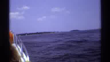 New York (1973): People Ride On The Boat As The Small Waves Bounce It Up And Down