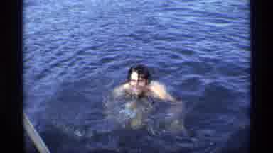 New York (1973): A Man To Enjoying The Swimming In A Sea And His Interest