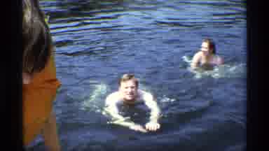 New York (1973): Outdoor Video Showing A Man And A Woman Swimming While A Kid