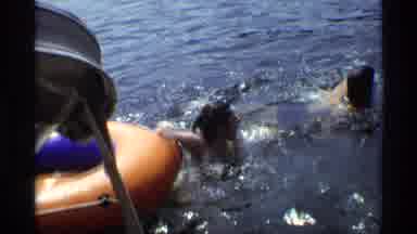 New York (1973): Swimming In A Lake Near A Raft Having A Water Fight