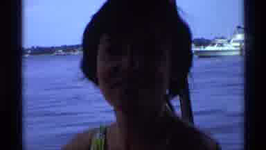New York (1973): Outside Recording Showing A Woman Smiling And A Man Playing With