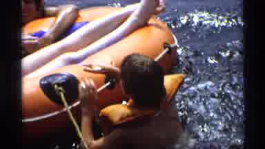 New York (1973): Outdoor Recording Of A Man Playing With Two Children In The Water