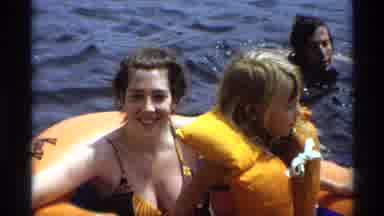 New York (1973): A Family Members Are Playing And Enjoying The Swimming In The