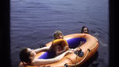New York (1973): Mom Dad Daughter Frolicking In A Lake With An Inflatable Raft