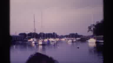 New York (1973): Outdoor Recording Showing Several Boats In A Port And Many Trees