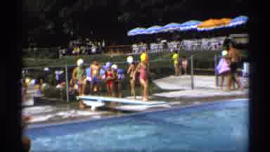 New York (1973): Line Of Children Waiting To Take Their Turn To Dive Off Of A Low