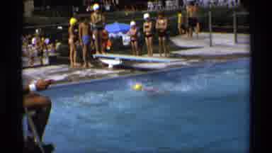 New York (1973): Some People Are Swimming And The Camera Is Focusing On The Person