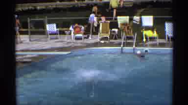 New York (1973): Little Girl Jumps From Diving Board Into Public Pool And Swims