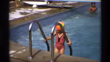 New York (1973): A Huge Number Of Persons Are Enjoying In The Swimming Pool Around