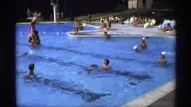 New York (1973): Group Of People Enjoying Their Time In A Swimming Pool