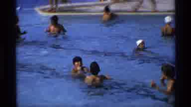 New York (1973): Kids Playing In Pool In Summer One Gets Splashed In Face And