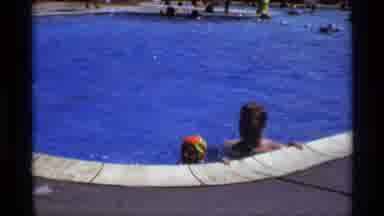 New York (1973): Families With Kids Enjoying Pool And Water Activities On A Summer