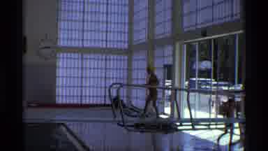 New York (1973): A Huge Number Of Persons Are Enjoying In The Swimming Pool Around