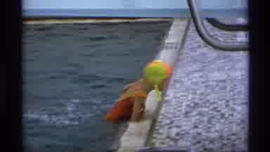 New York (1973): A Huge Baby Of Persons Are Enjoying In The Swimming Pool Around