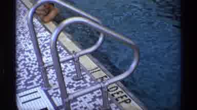 New York (1973): People Swimming In The Deep End At Indoor Swimming Pool