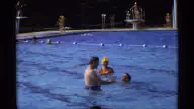 New York (1973): A Huge Number Of Persons Are Enjoying In The Swimming Pool Around