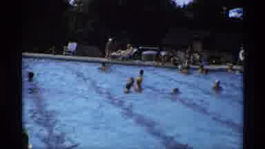 New York (1973): Little Girl Swimming In The Pool While Everyone Is Swimming