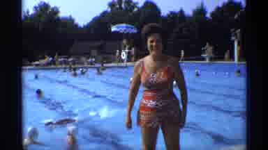 New York (1973): A Huge Number Of Persons Are Enjoying In The Swimming Pool Around