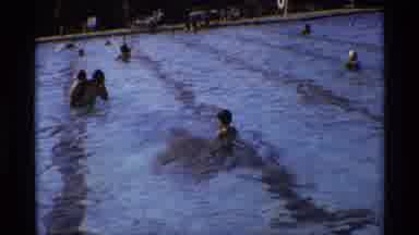 New York (1973): People Playing Together In A Public Pool And Having Fun