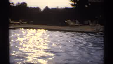 New York (1973): Six People Playing In Near Empty Pool On A Clear Day