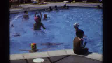 New York (1973): People Playing In Swimming Pool On A Bright Sunny Day