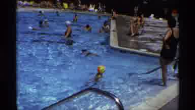 New York (1973): Little Boy Coming Out Of Crowded Public Pool With Two People At