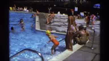 New York (1973): Young Girl Wearing A Orange Bathing Suit Jumping Into The Water