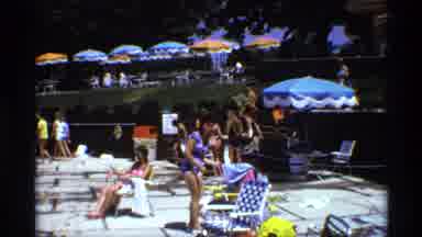 New York (1973): A Man Is Lovingly Filming His Wife As She Prepares To Sun On